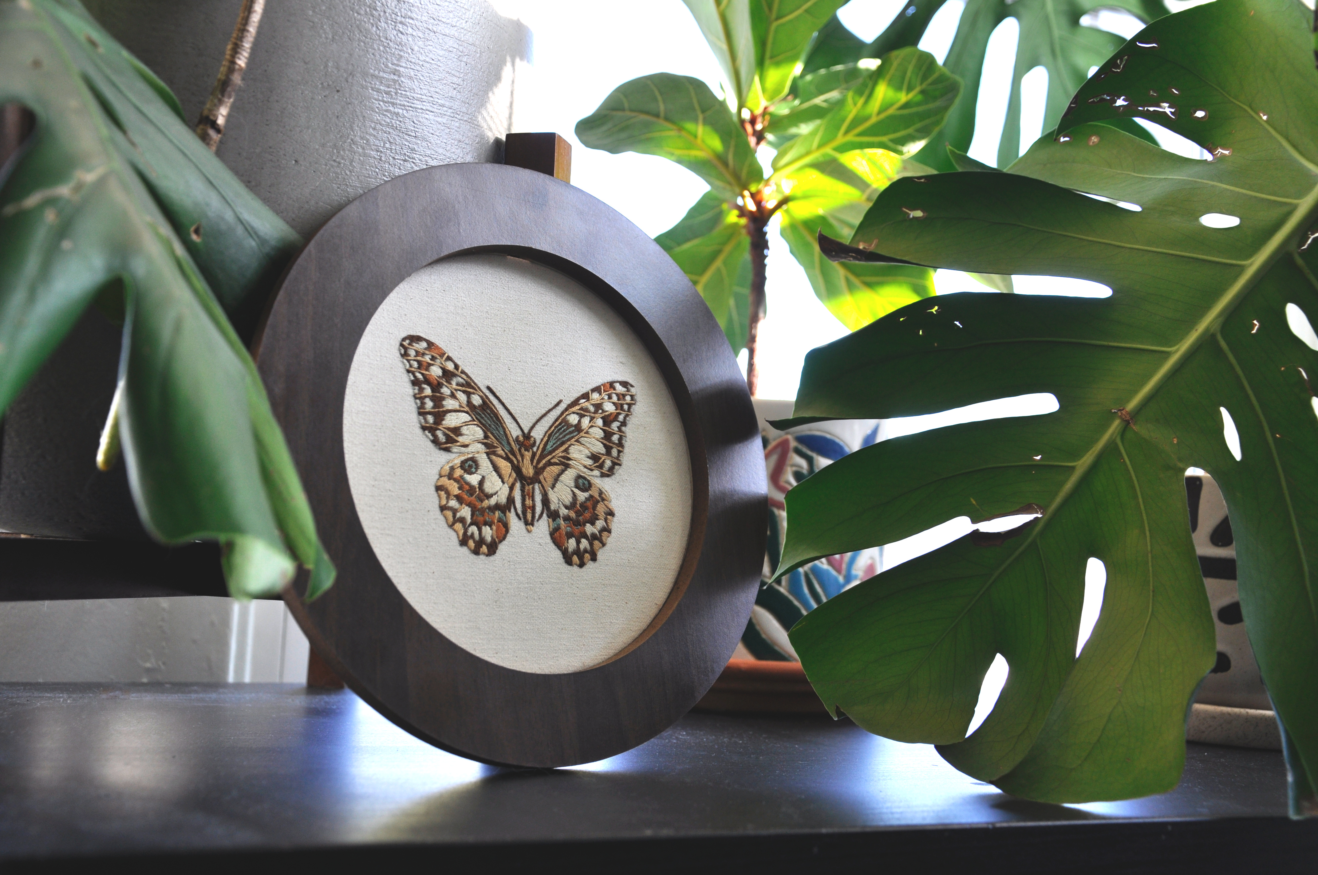 Embroidered butterfly hoop by Ash Lewis